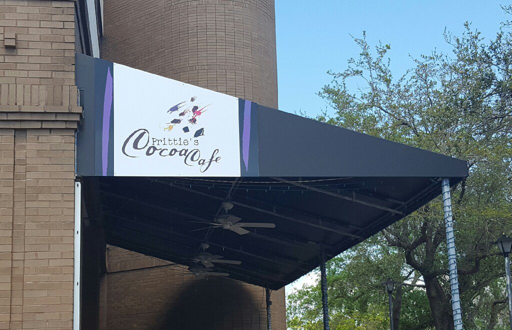 Tampa_Bay_Signs's tweet photo. Dibond Sign - Printed on 3M vinyl with gloss laminate and mounted to a custom-shaped 3mm dibond panel. 
#dibondsigns #prittiescocoacafe https://t.co/Nh7fJxJlVe