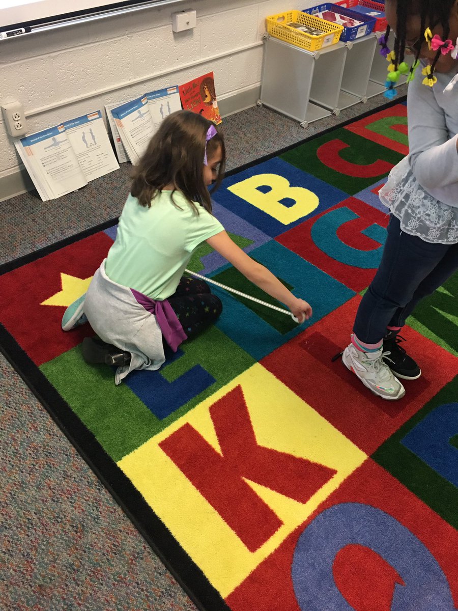 kimknysz's tweet photo. It's data day in second grade! Mathematicians are using tape measures for standing long jumps and arm spans @WLETigers https://t.co/nfIs0vTbK0