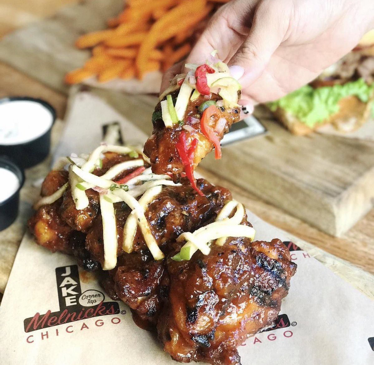 jakemelnicks's tweet photo. Grab a hold of our Drunken Cider wings, now's your chance to try them before they are gone! Photo by @topchicagoeats  #wingofthemonth https://t.co/iEK2oiJH0n