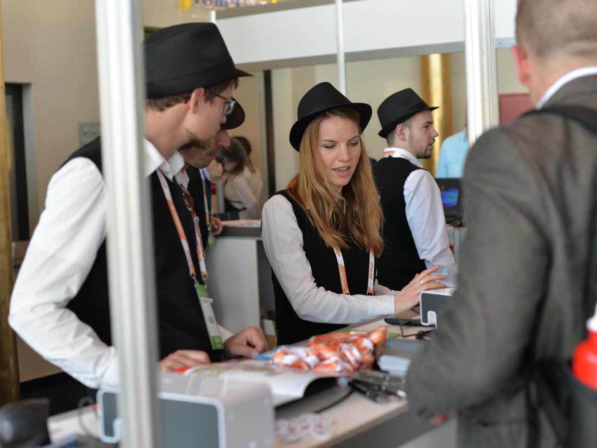 cloudfest's tweet photo. Here are the attendants happily signing up attendees. #WHDglobal #MakeHostingGreatAgain https://t.co/Hn8VQ7dqgm