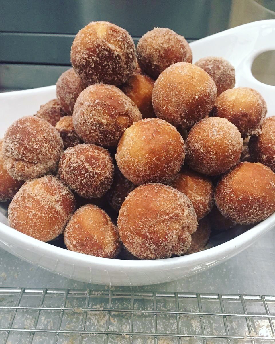 ThePlateKitchen's tweet photo. A bowl full of our heavenly li'l donut balls- aka Chubbies-
made fresh Wed-Sun and sold in threes cause good things come in threes! ❤️3️⃣❤️ https://t.co/kzlQ5CubSz