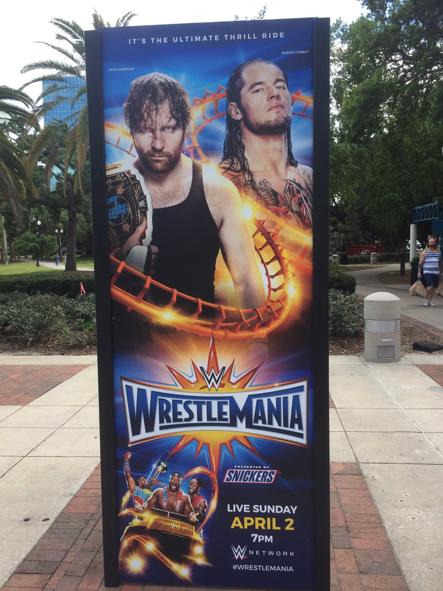 JonMoxleyDotNet's tweet photo. Dean on a #Wrestlemania banner. I found this at Eola park in Orlando Florida.. -jess https://t.co/FwtRRS581x