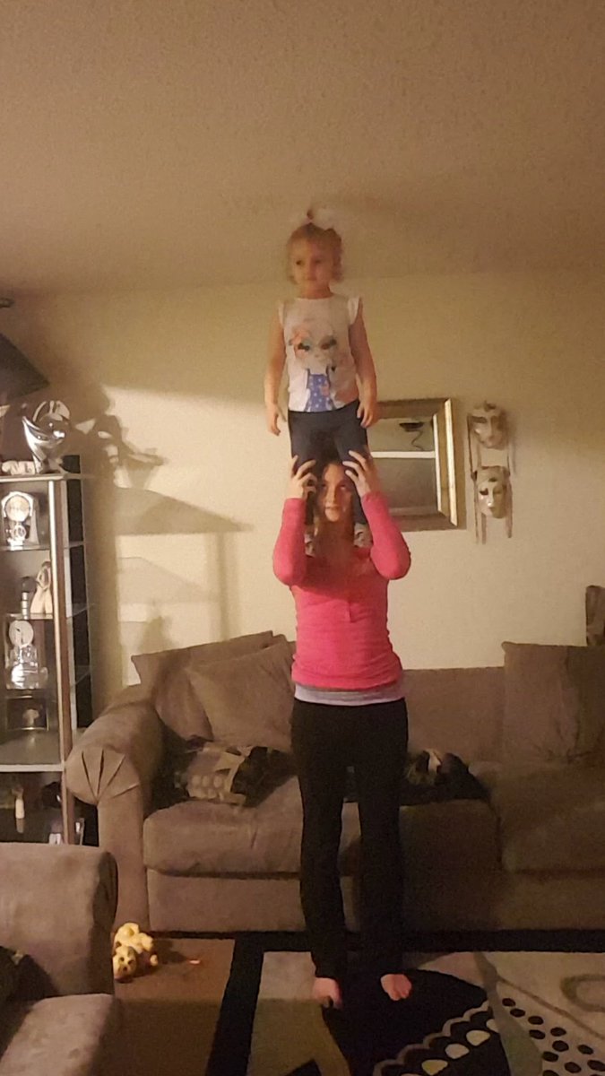 Jacklne_Clark's tweet photo. Taught my baby how to do a shoulder stand #futureflyer #Cheerleaderintraining https://t.co/NETEfwvz73