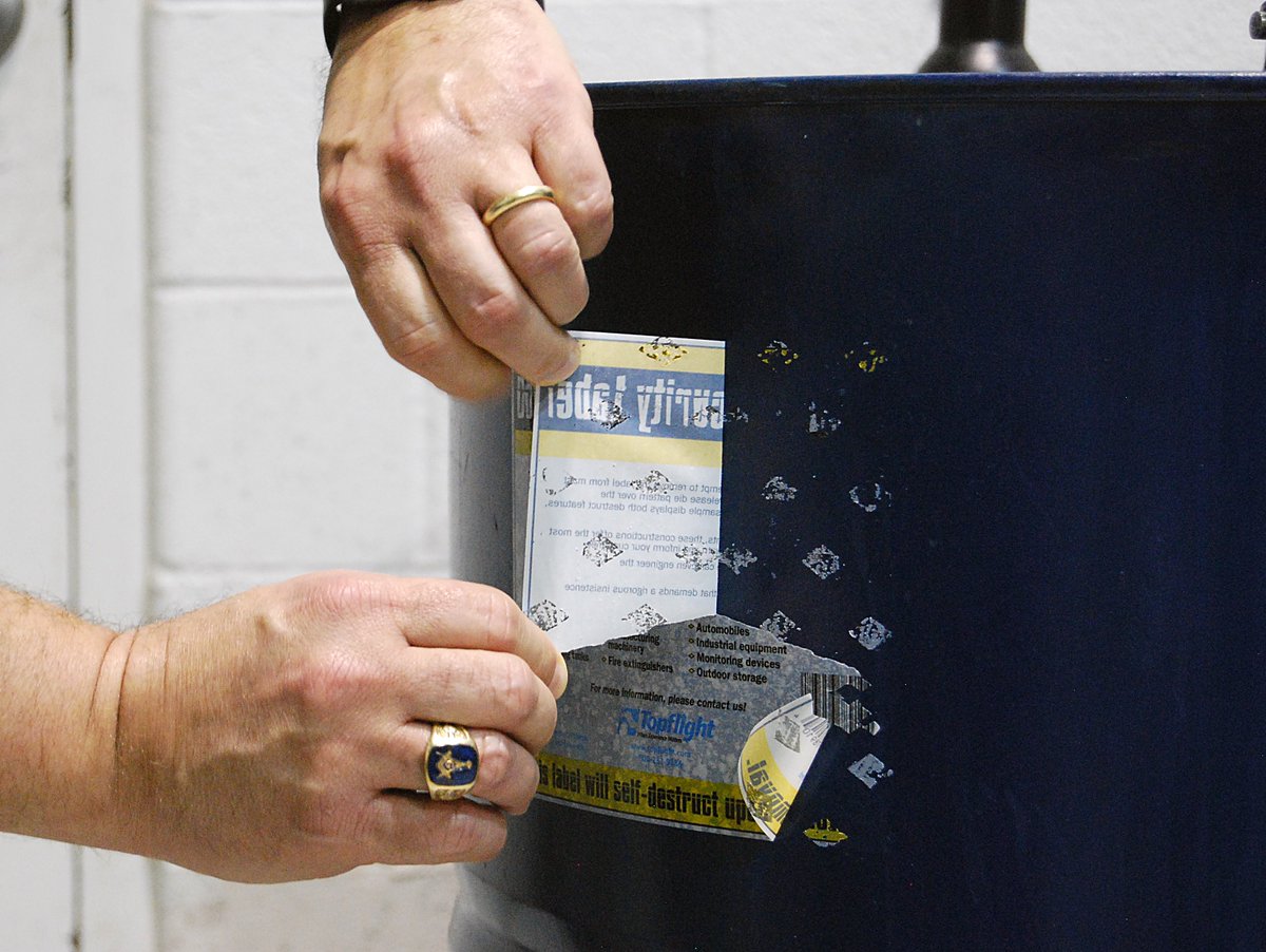 TopflightCorp's tweet photo. Topflight labels STOP #LabelTampering: security slits, patterned adhesive zones, custom printed void patterns https://t.co/hSnYTOLnHq https://t.co/D3W868s09R