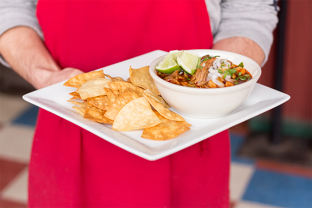 GETaqueria's tweet photo. Warm up with our pozole. Made w/ hominy, red dried chillies, &amp; pork shoulder w/ cilantro, onions, lime &amp; house-made chips. #avleat #avlfood https://t.co/EurOF74P1F
