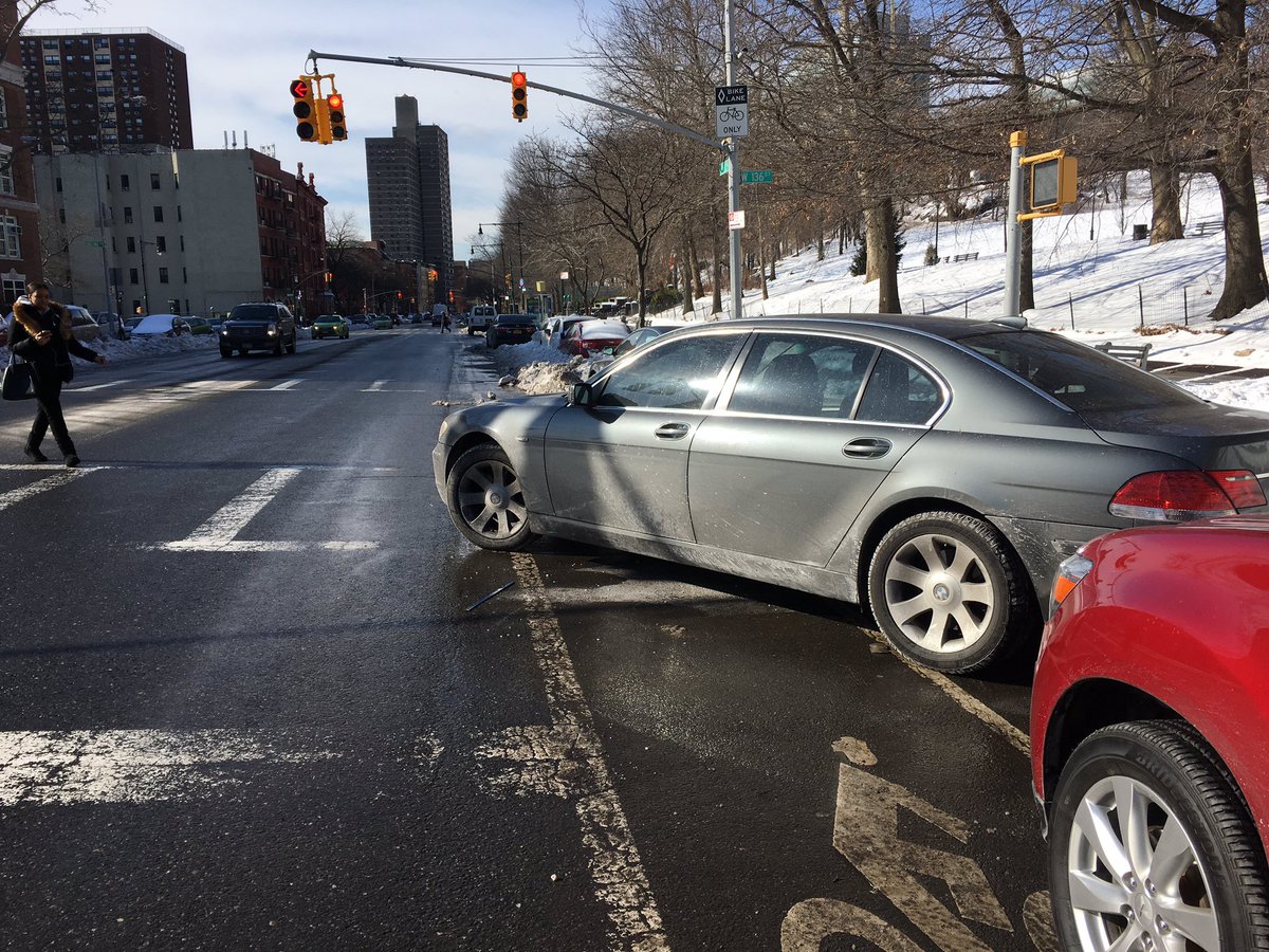bikesnobnyc's tweet photo. And the "It's Snowy So Fuck It" parking award goes to...

--Bike lane? Check.
--Crosswalk? Check.
--School zone? Check.
--BMW? What else? https://t.co/J4EpkNSx3s
