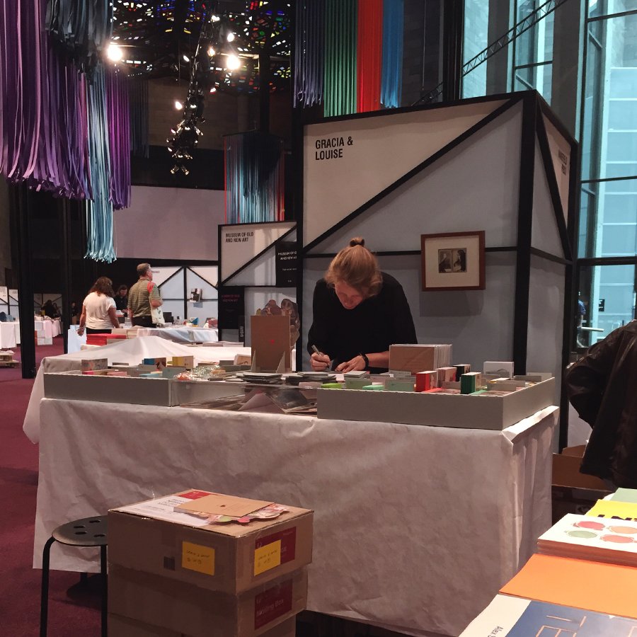 gracialouise's tweet photo. Set, ready, scissors: https://t.co/57Ntz37roU (Setting up our #artistsbooks and #zines at this year's #NGVABF, @NGVMelbourne.) https://t.co/sQSuWpaEut
