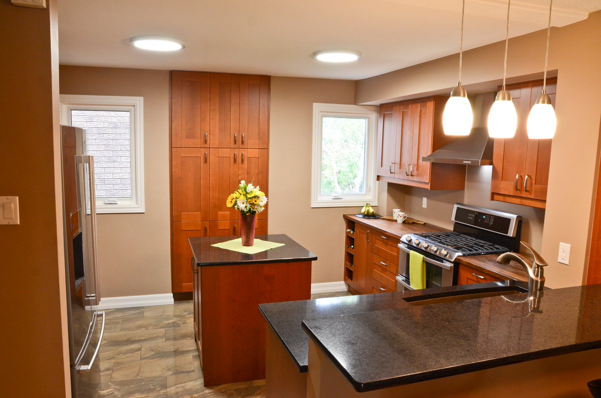 BlackWalnutKB's tweet photo. Mixing counter types like Black Walnut butcher block and Cambria Quartz is a wonderful way to stretch your renovation budget. https://t.co/Ft3Y0E2QYp