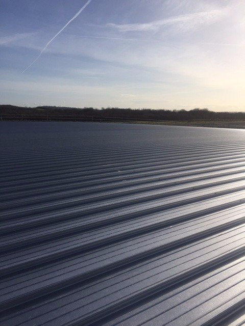 Just completed 5,500 sqm of curved Kalzip roofing at BAE Blackburn in 3 and a half weeks!  105m long sheets rolled at eaves, well done team!