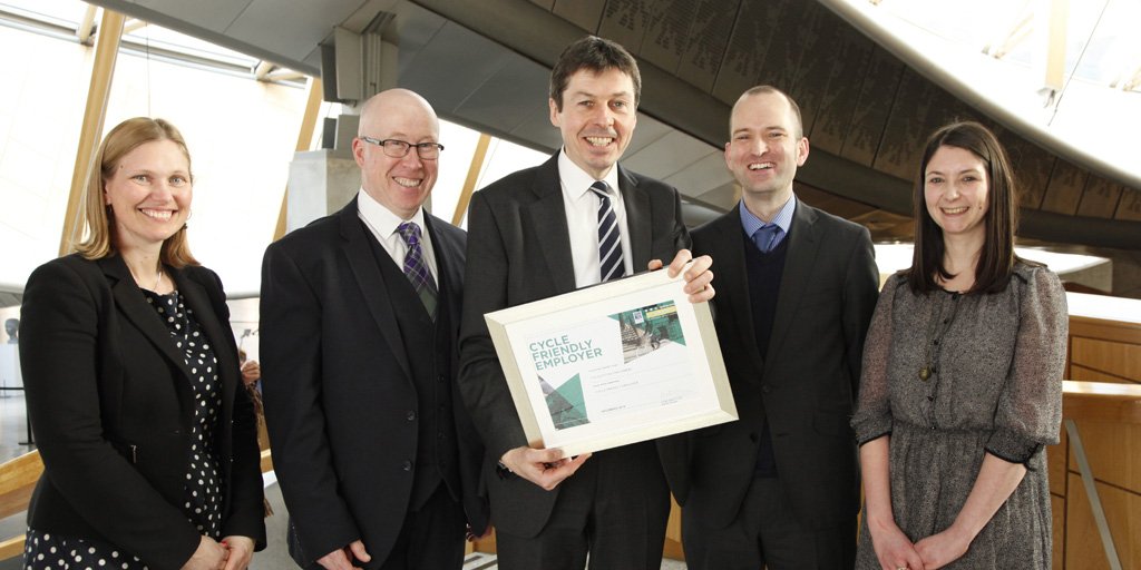 .<a href="/ScotParl/">Scottish Parliament</a> is officially a Cycling Friendly employer! PO @KenMacintoshMSP accepted our award from <a href="/CyclingScotland/">Cycling Scotland</a> &amp; <a href="/TheBikeStation/">The Bike Station</a>.