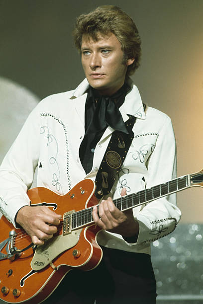 smet_us's tweet photo. French singer and actor Johnny Hallyday on stage. https://t.co/kv9Cd6tWEf