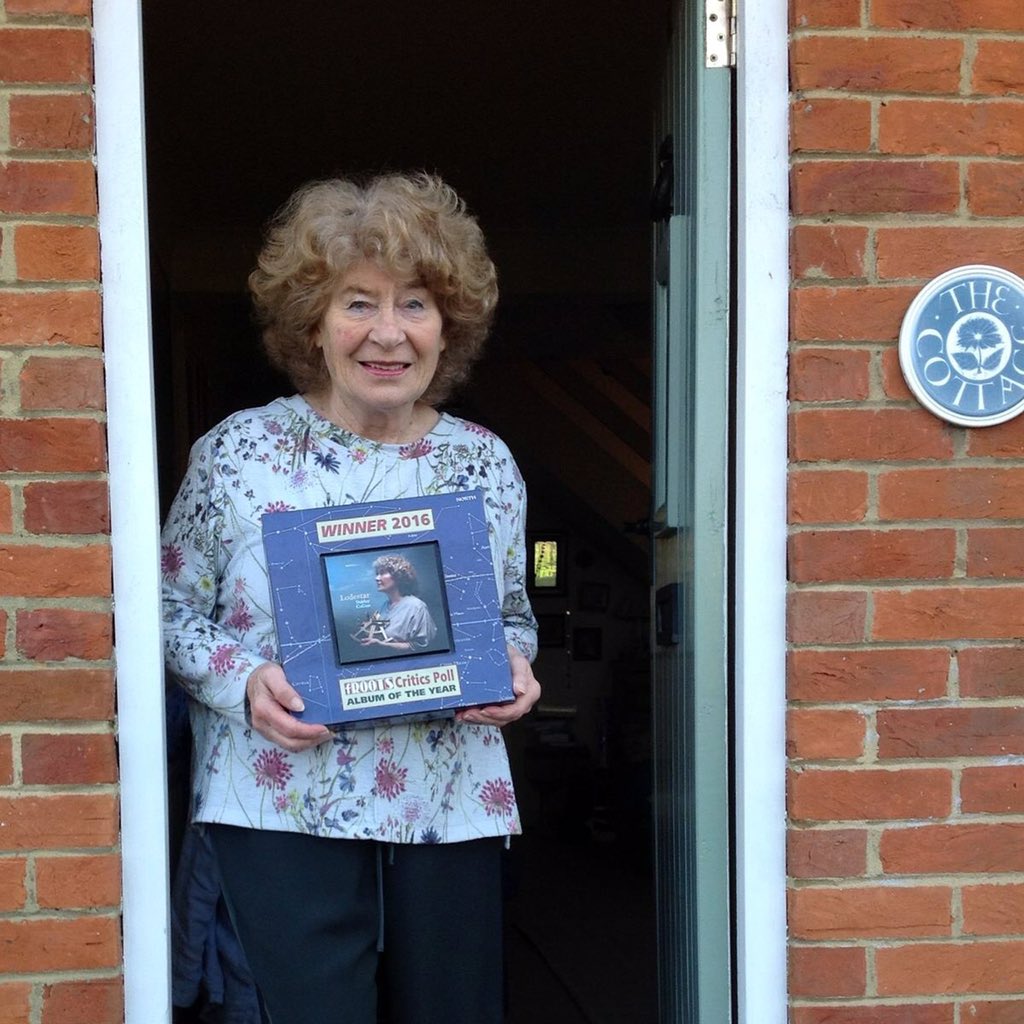 frootsmag's tweet image. Here's Auntie @shirleyeCollins at home in with her fRoots #criticspoll #AlbumOfTheYear Award (made by Lewis artist @MarionBrandis).