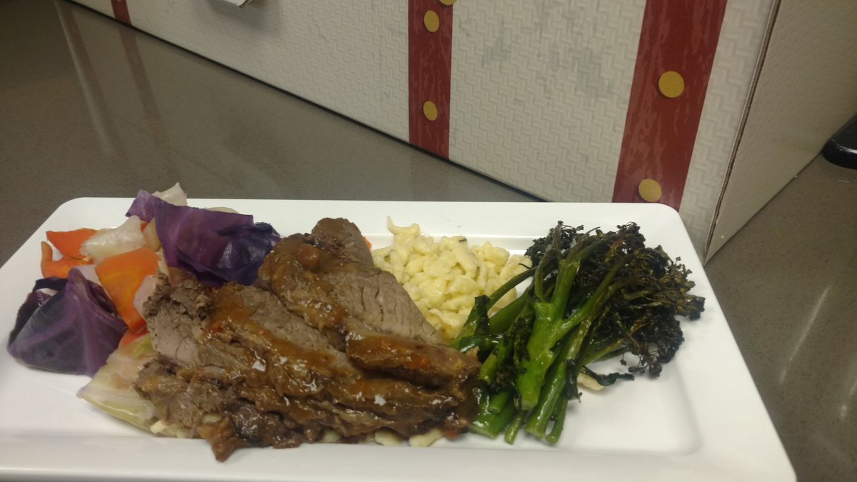 FlikDarlington's tweet photo. Third meal of the day in Munich: Sauerbraten, spaetzle, cabbage and carrots, and broccolini. #tfexpress @FlikISDining https://t.co/6GQ92tb22N