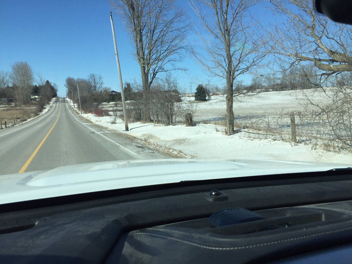 The difference between no till and moldboard plowing. Taken on the same road, less than a mile apart.