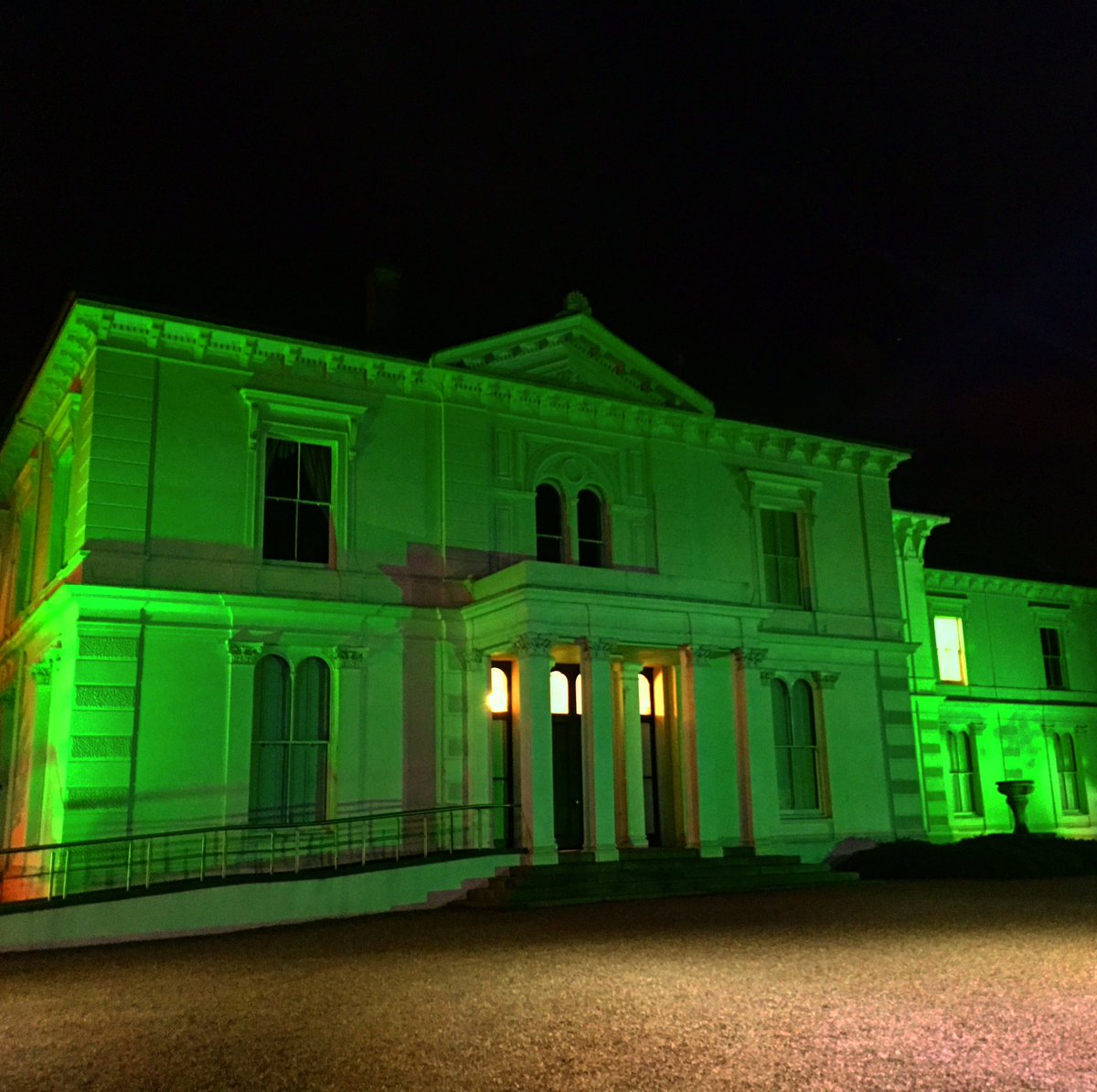 UL's tweet photo. The White House in UL turns green for #StPatricksDay We hope you all enjoy the festivities #globalgreening ☘️ https://t.co/hTopxtU9Bx