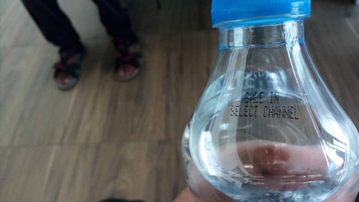 sumanthraman's tweet photo. At Chennai airport 500 ml Kinley water is sold for Rs.40/-.Board says water at MRP. Bottle has no MRP.Says Sale at Select channel.@CocaCola https://t.co/SSlZFbjQ7k