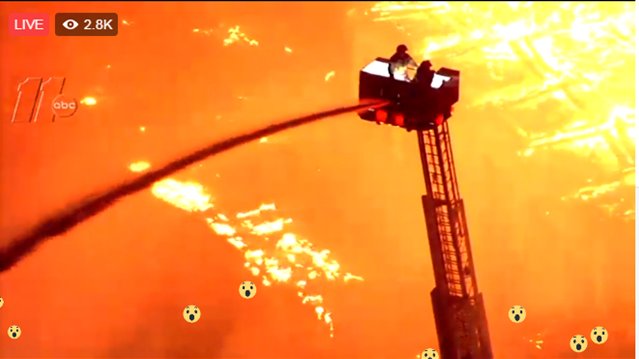DannyRosin's tweet photo. Powerful imagery of mother nature in battle with #Raleigh's finest. Sending prayers to everyone in #DowntownRaleigh #FIRE https://t.co/YmgZPIpeUr