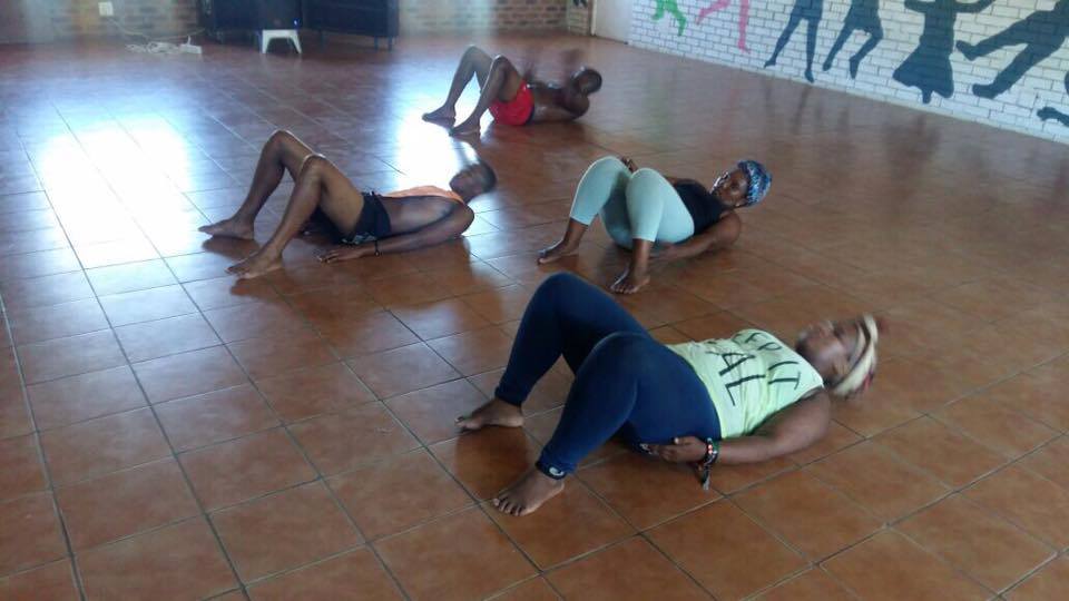 The staff from Legacy, one of our partners are enjoying exercise classes from Amanda at our center in Kayamandi.
