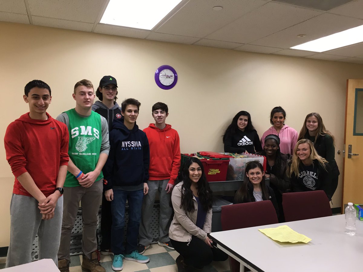 GuilderlandNHS's tweet photo. NHS students help out wrapping candy at Captial City Rescue Mission in Albany https://t.co/Q926UkfFl3