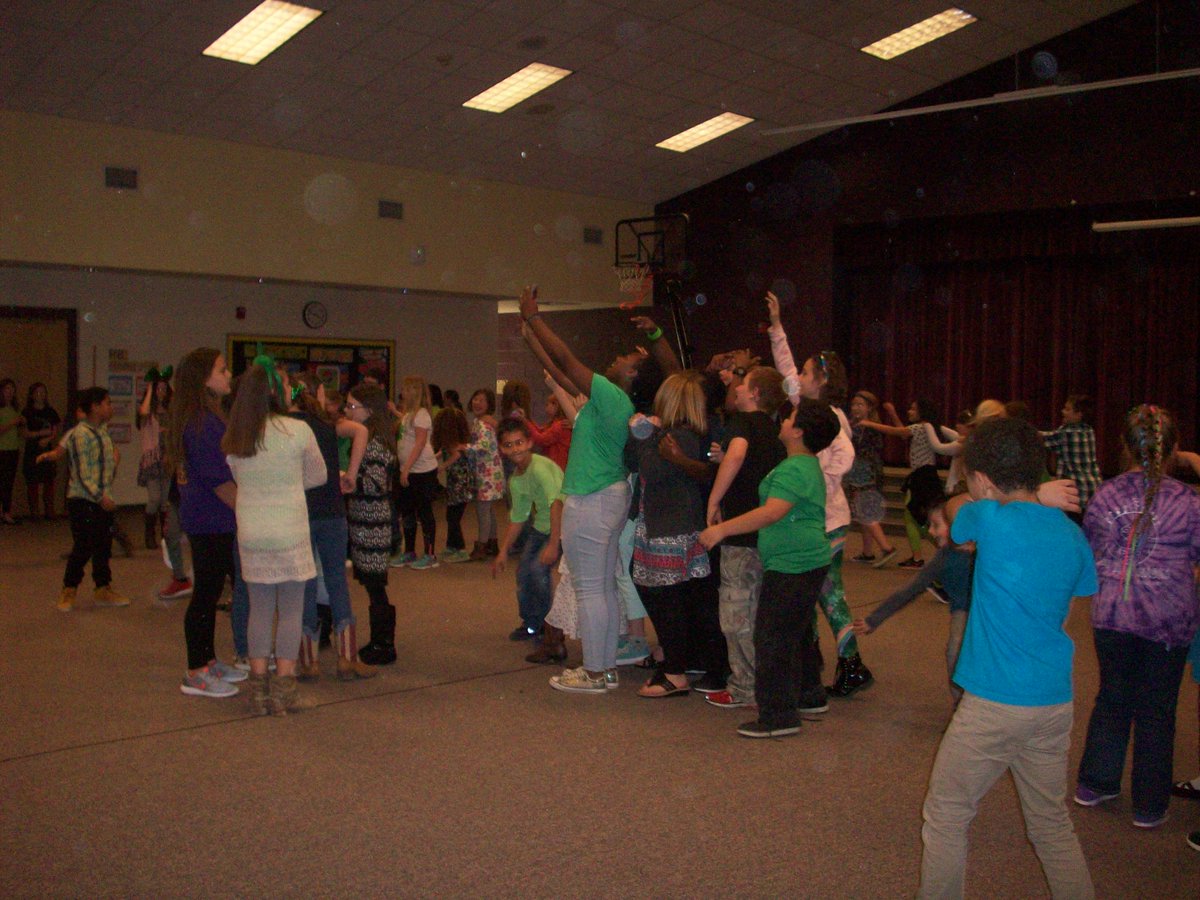 4th and 5th grader dance "Painting St. Patrick's Day Purple"