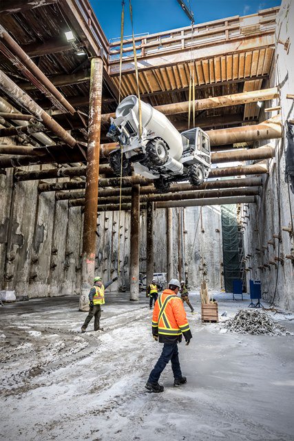 jen_keesmaat's tweet photo. Mini cement tracks are lowered into the LRT tunnel for the building of the tracks below Eglinton. #BuildingTransit https://t.co/r7TsUUc2le