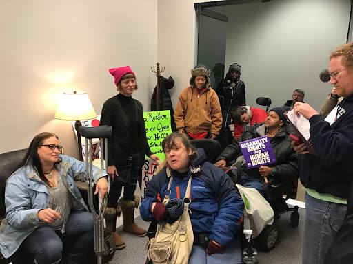 NationalADAPT's tweet photo. .@ADAPTChicago chanting at @PeterRoskam office, "What do we want? CIVIL RIGHTS! When do we want it? Now!" #SaveMedicaid #CFCO #NoAHCA https://t.co/0o0qY7OFK9