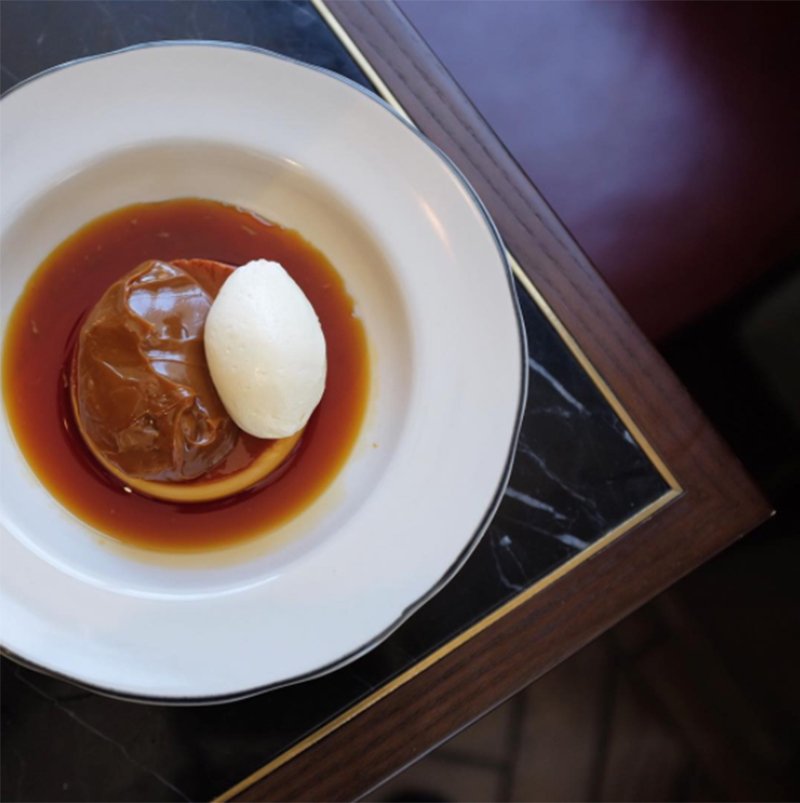 newsforfoodlov's tweet photo. What do you think makes a great dessert? This beauty is @portenosydney's Flan Mixto with dulce de leche. #TheYellowGuide #GaultMillau https://t.co/FsRVLPHREn