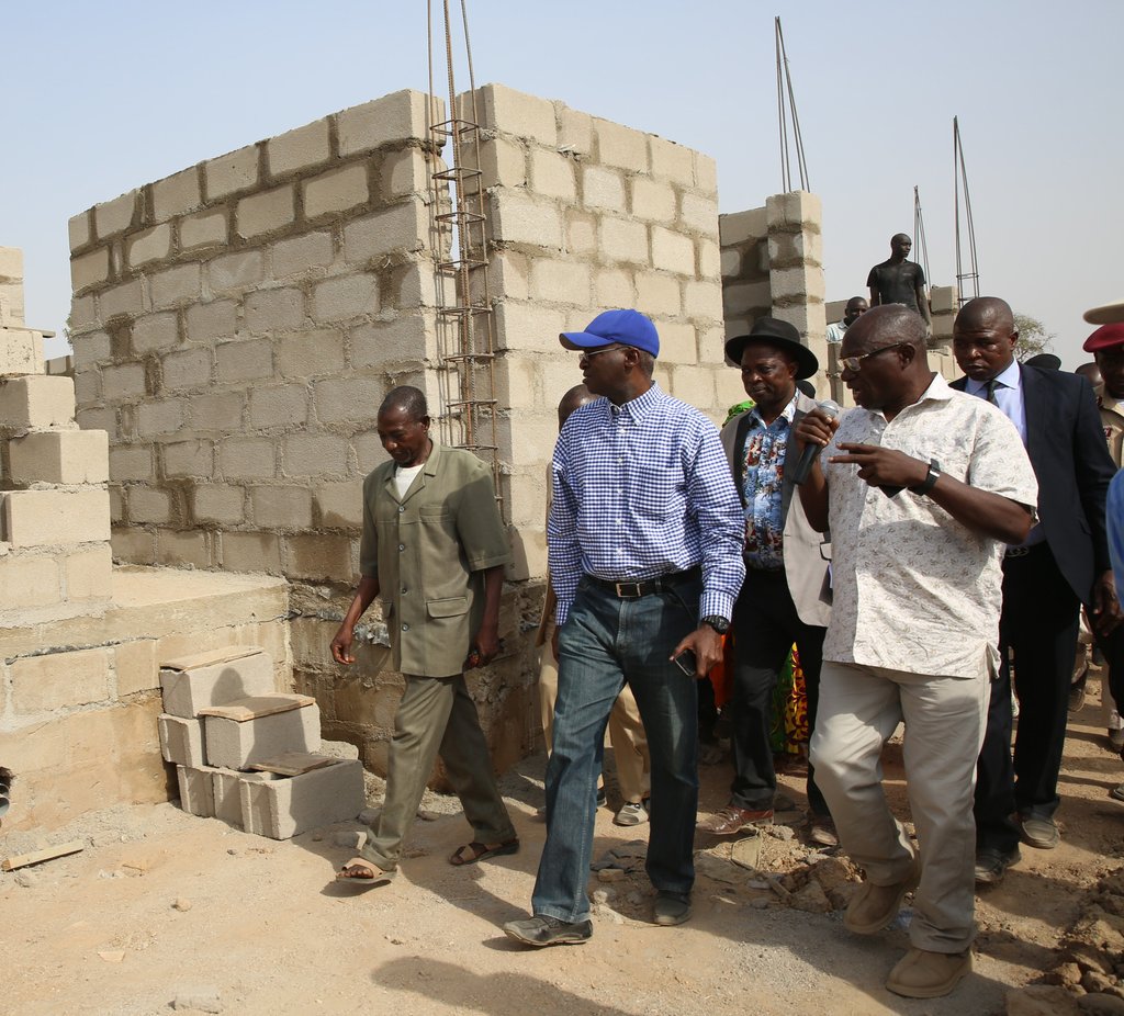 FMWNIG's tweet photo. HM @TundeFashola interacting with one of the artisans at the  at yesterday's inspection of the 76housing units in Taraba #FasholaNETour https://t.co/s2zKcO3XBE