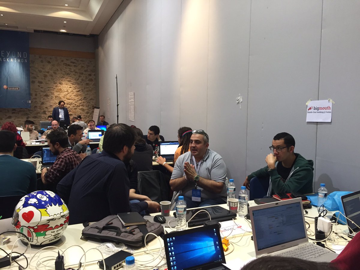 siioannidou's tweet image. Kostis Vougioukas, representing the Branch Network Division, working closely with his mentees! #beyondhackathon