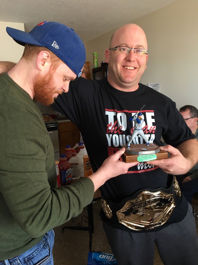 CharlesTweed's tweet photo. The champ being presented his trophy from the runner-up, who feels shame. #mbbl #fantasybaseball #outlook https://t.co/Qf3yQVDJML