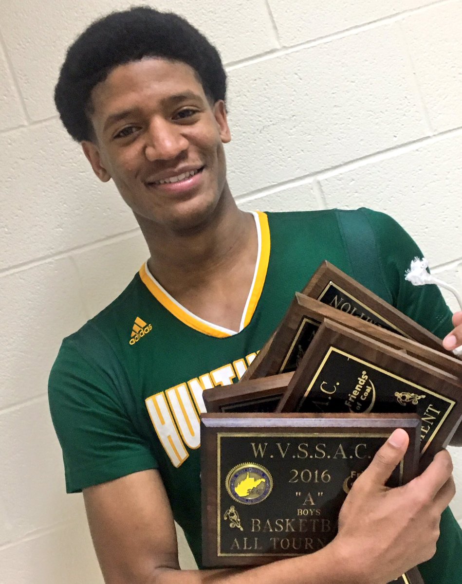 TheJDubTweets's tweet photo. This is what four WV state basketball titles look like. Huntington's @mrclutch_2 #wvprepbb https://t.co/Zv27UeMMYw