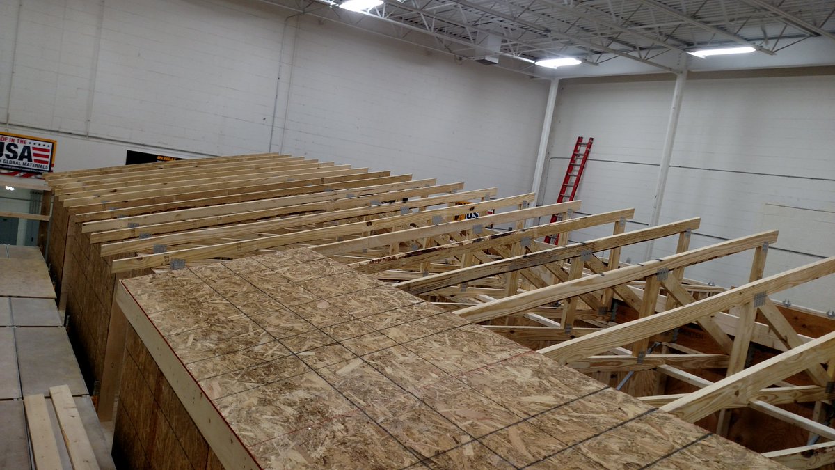 benjamin_hamann's tweet image. All the trusses are up on GB6 trailer 2 and sheathing is in progress. #greenbuild