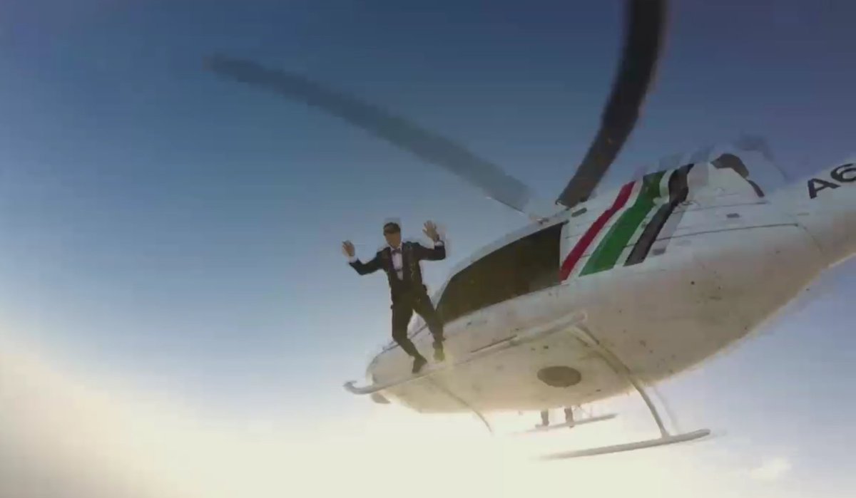 TeacherPrize's tweet image. .@BearGrylls jumps out of a helicopter to deliver the Global @TeacherPrize trophy to the awards ceremony!