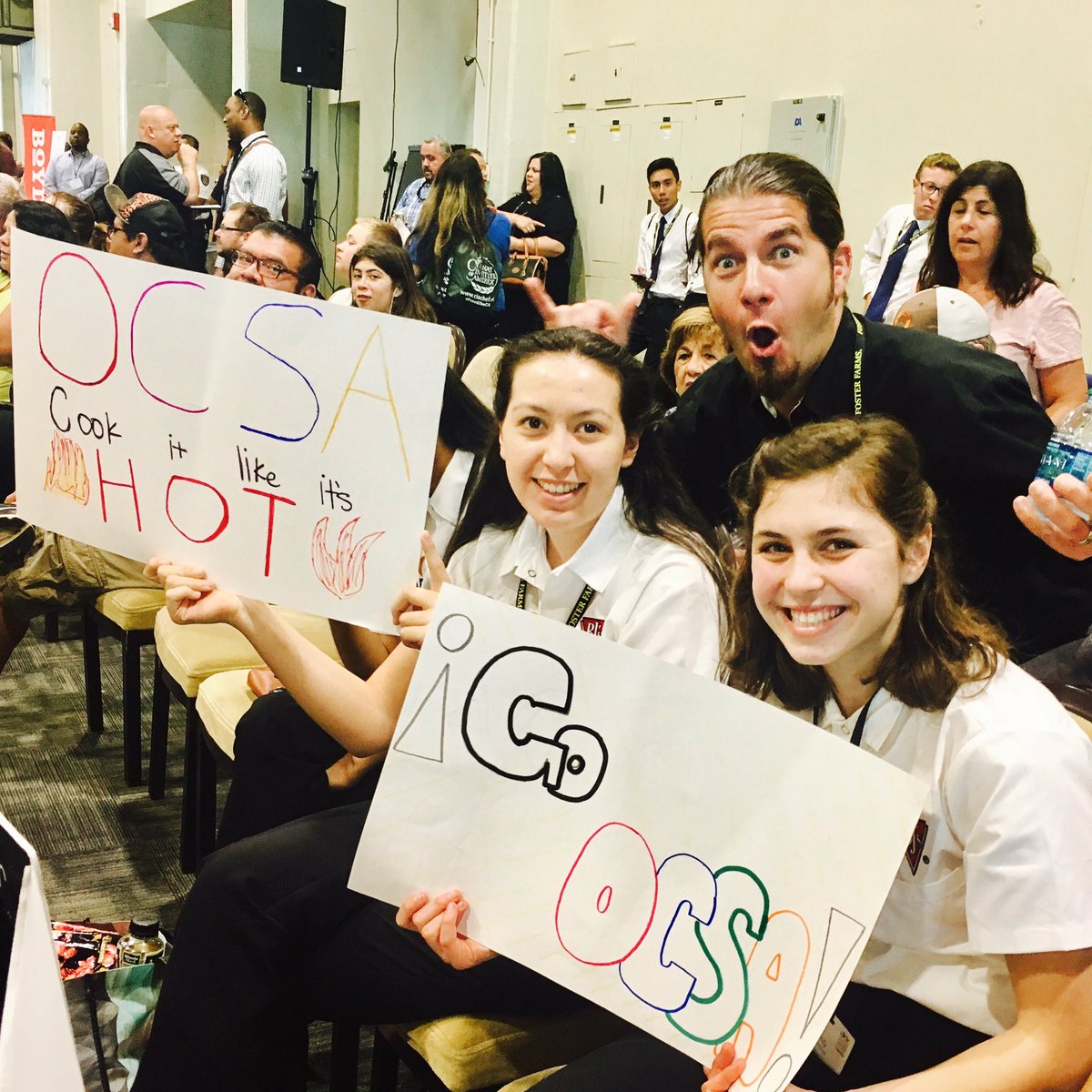 OCSA_CA's tweet photo. Management team members Emily Fedorchek &amp; Hannah MacDonald cheer on the Culinary team. (Photo bomb courtesy Chef Mattos) #caprostartcup https://t.co/os0haITR3h