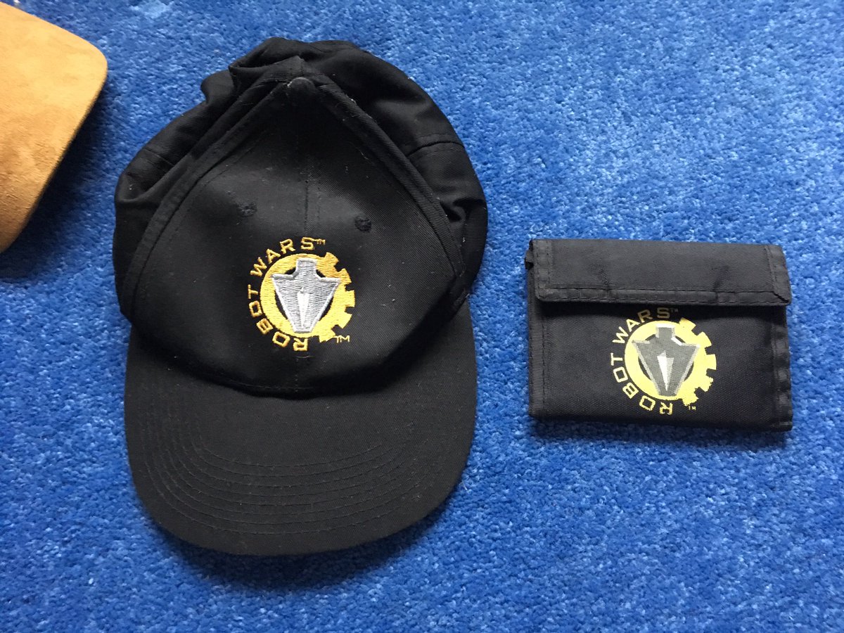 ChrisW_J's tweet photo. Got my Classic #RobotWars hat & wallet ready for Episode 3 of @UKRobotWars In one hour (7PM) on @BBCTwo #NoMachineIsSafe #Merchandise https://t.co/IYhzPeuVMC