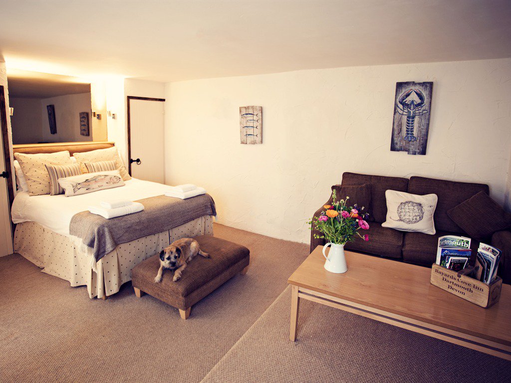 Our #room Fisher is beautifully decorated &amp; furnished with a comfy couch area, which is perfect for relaxing in with a glass of divine #wine