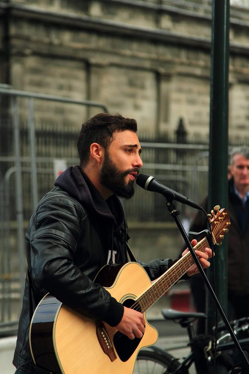 fan_jaf's tweet photo. Busker in Grafton Street Dublin in colour https://t.co/18UxBatTMy