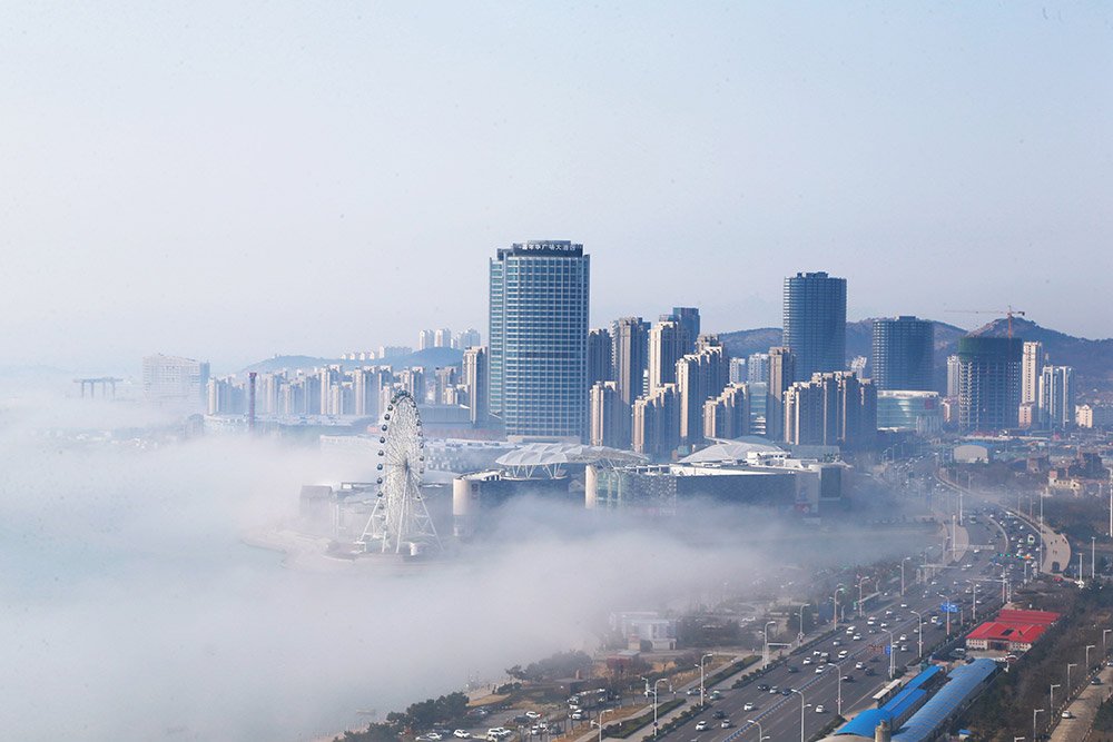 Advection fog enshrouded Qingdao in east China on Mar 19. Advection fog