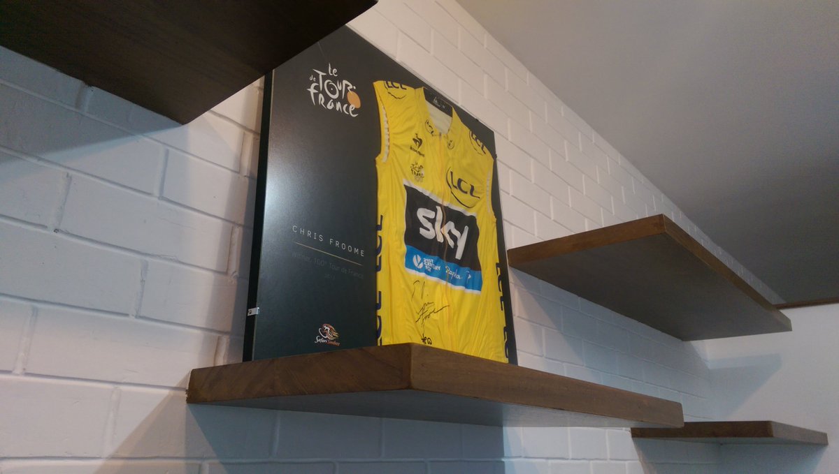 Our prized Tour de France jersey finds a new home, as we move into our new office in Westlands.