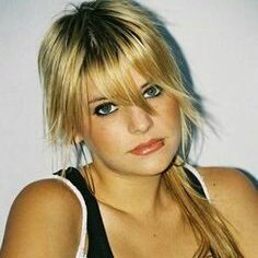 "My pouty  face .....damn. it is kinda cute ."Giggles.