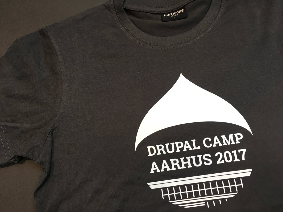 dcaarhus's tweet photo. T-shirts for Drupal Camp Aarhus 2017 just arrived - are you starting to get excited yet? #dcaarhus #drupal https://t.co/tHIC4vim2p