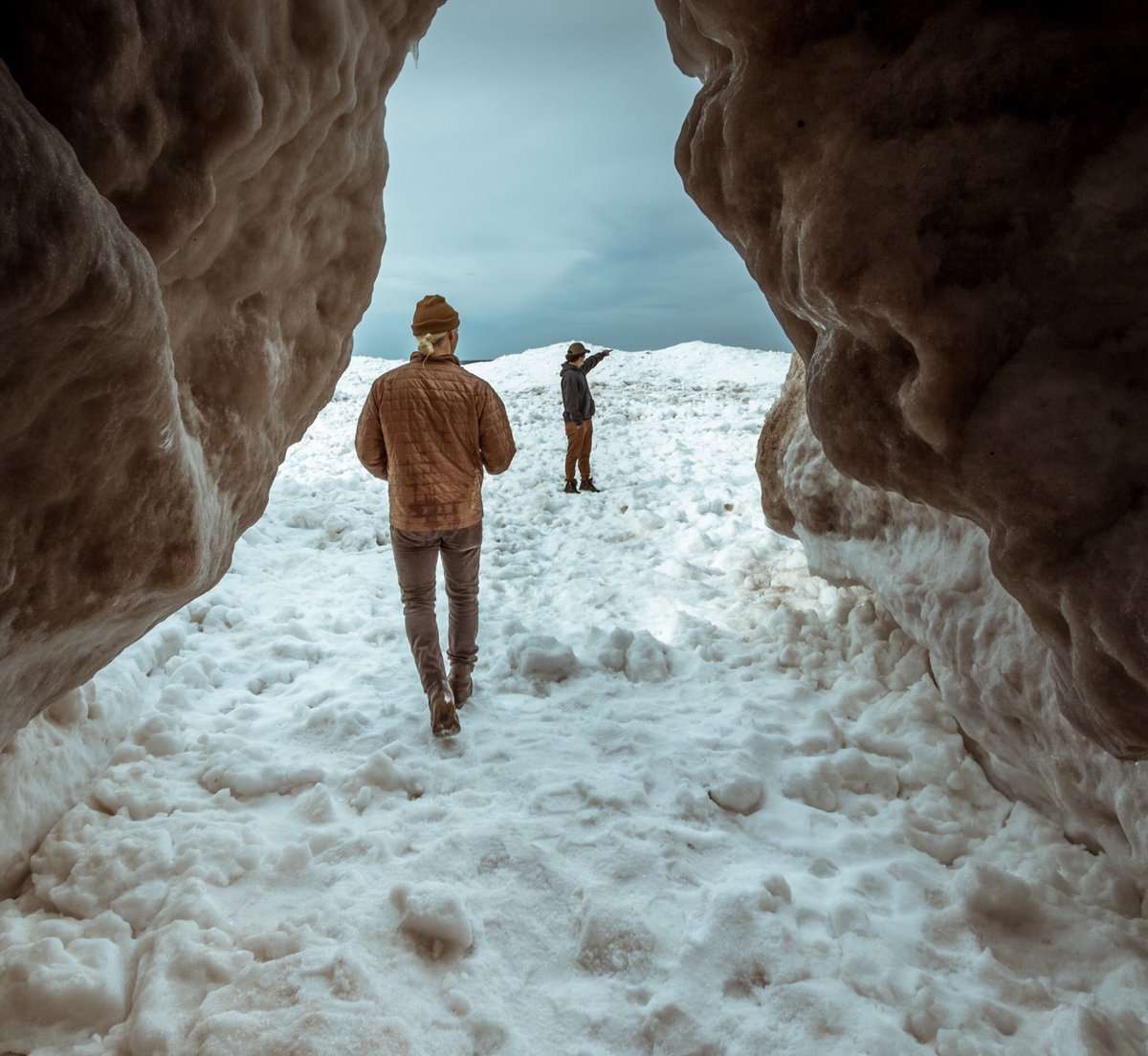 Spnencer's tweet photo. Dog, frozen waves, little island, ice caves https://t.co/XUjbqbbEaD
