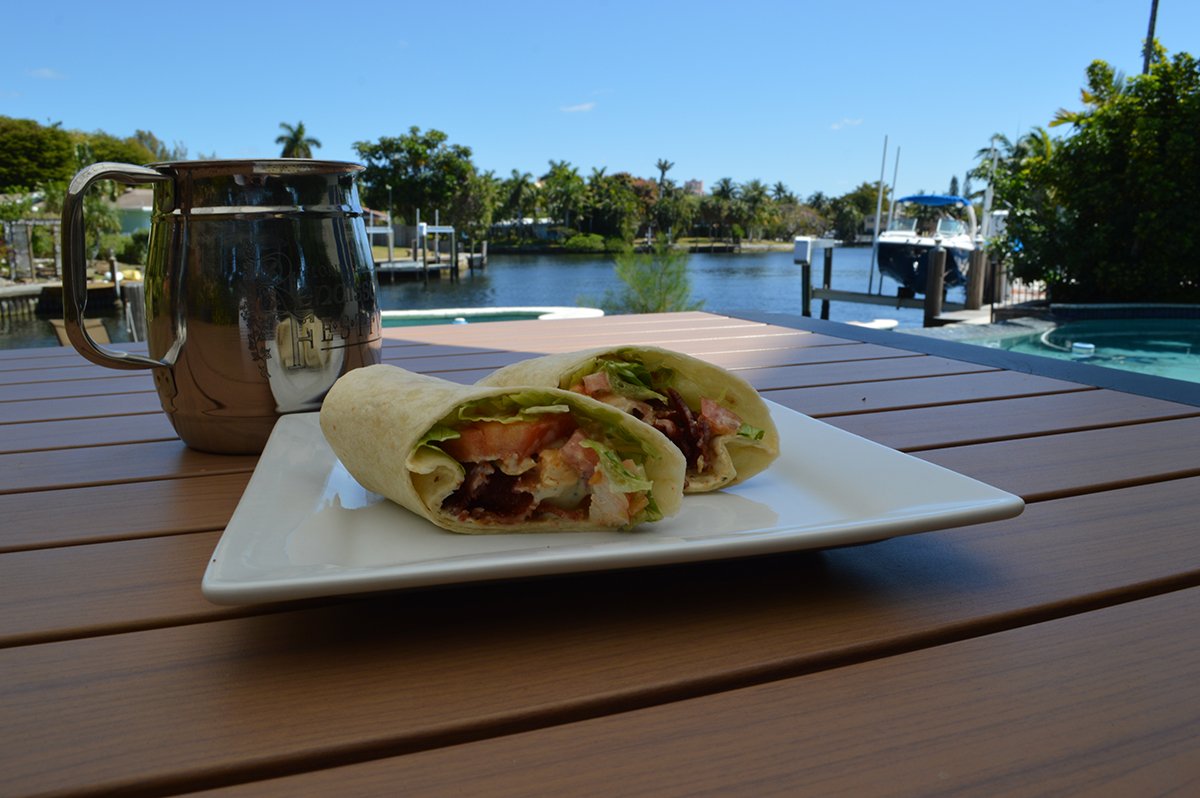 Complexity's tweet photo. Hello from sunny South Florida!

#coLDota is kicking off the day with @Not_Schmidty's outdoor lunch of cilantro avocado chicken wraps. https://t.co/25AYIlC7g6