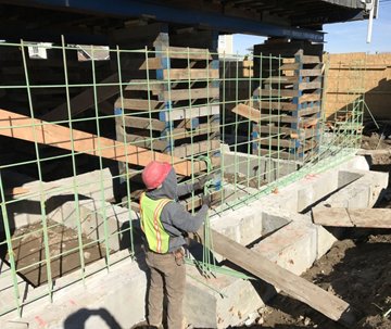 NYCHRO's tweet photo. @NYCBuildItBack contractors working on installing rebar for foundation walls and formwork for walls @ a Broad Channel home https://t.co/iBpusjpMIk