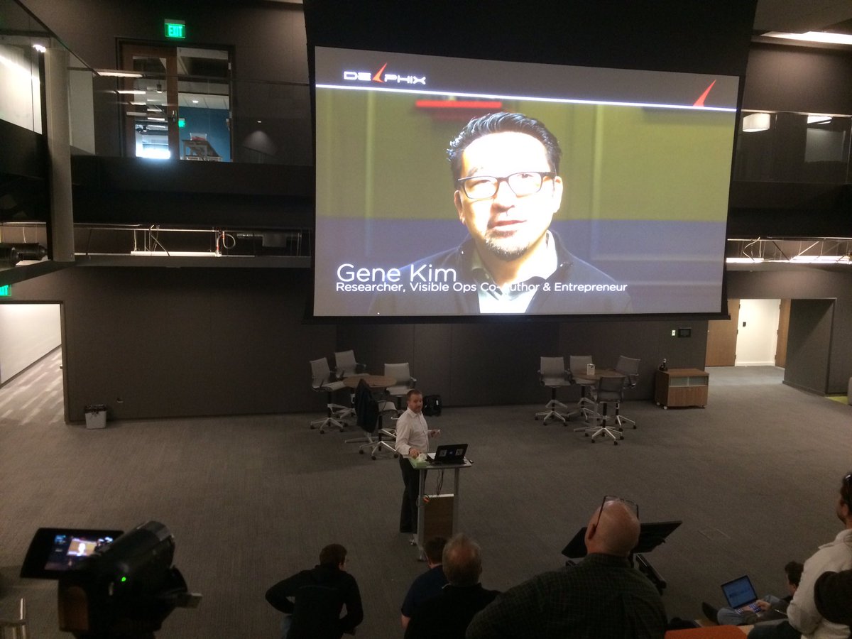 DevOpsKC's tweet photo. On to the main event: @CloudSurgeon discussing #DevOps and how to mind the data gap https://t.co/tilwChSpak