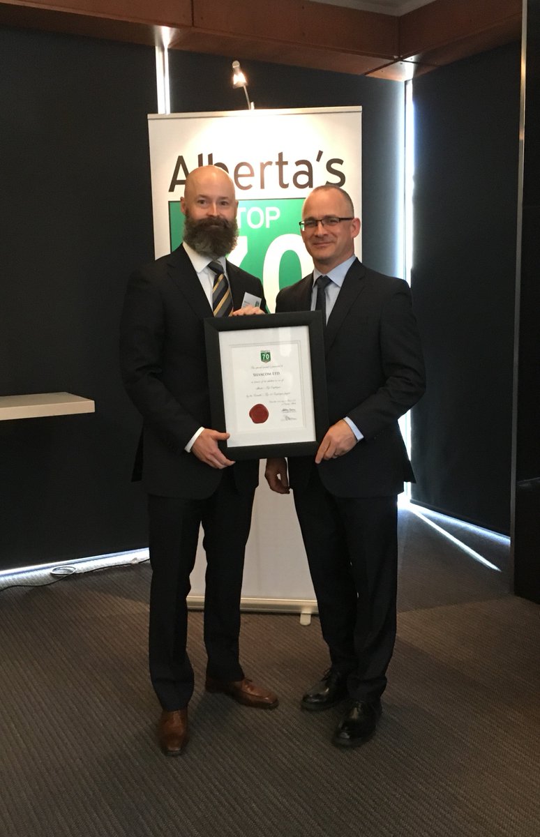 Silvacom's tweet photo. Our VP of Operations @RickLReid pictured receiving our Alberta's Top 70 Employers award from Richard Yerema, Managing Editor @top_employers. https://t.co/hEt8tAkug3
