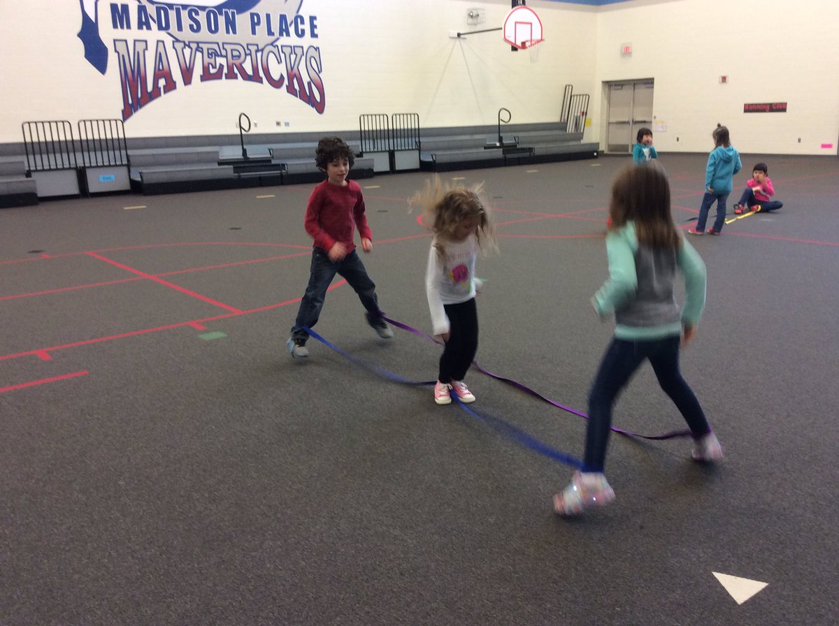 Kindergarten students creating jumps with jumps bands in PE <a href="/MadisonPlaceK5/">Madison Place</a>