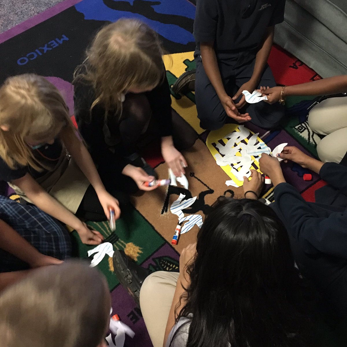ms_englehart's tweet photo. Today our 6th grader buddies came over today to work on our Greek Independence Day project. We glued birds onto cages. #sb212 https://t.co/o6uiApMO4f