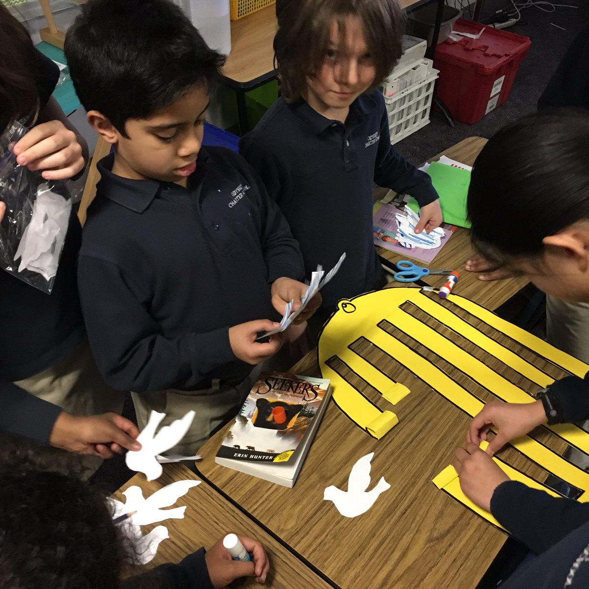 ms_englehart's tweet photo. Today our 6th grader buddies came over today to work on our Greek Independence Day project. We glued birds onto cages. #sb212 https://t.co/o6uiApMO4f