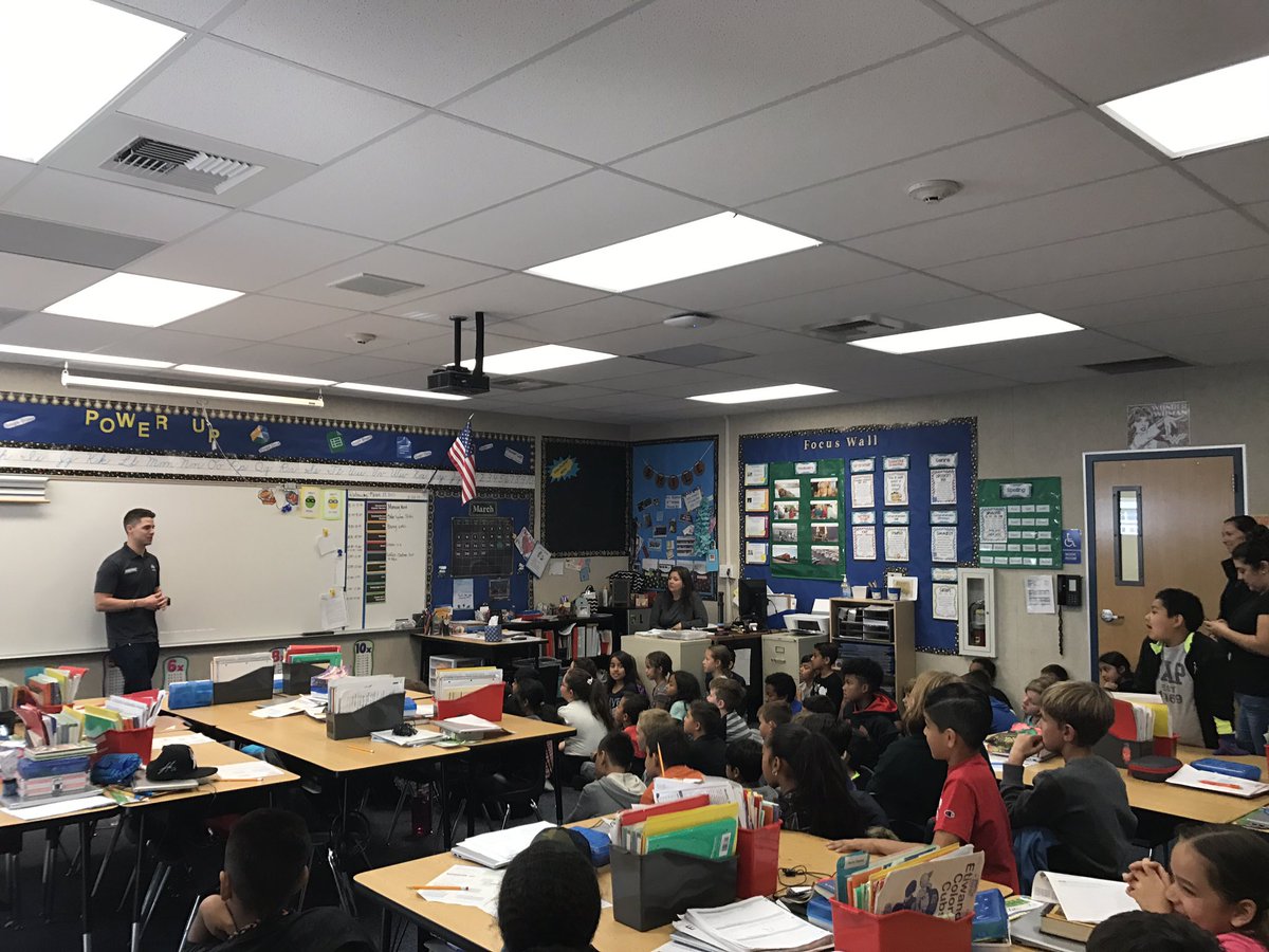 NextGenCA's tweet photo. .@driverRyanReed talking with students about racing &amp; upcoming #serviceking300 at #leftysreadingchallenge top performing school 🏁 https://t.co/QZUhGnRe5n